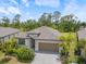 Well maintained home with paver driveway, two car garage, and mature landscaping in a beautiful neighborhood at 1993 E Isles Rd, Port Charlotte, FL 33953
