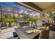 Enjoy outdoor dining and relaxation on the lanai with a hot tub and grill with views at 1993 E Isles Rd, Port Charlotte, FL 33953