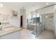 The main bathroom has granite countertops, double sinks, and a large, glass-enclosed shower at 1993 E Isles Rd, Port Charlotte, FL 33953