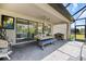 Dining area with ceiling fan and views of the beautiful outdoor living at 1993 E Isles Rd, Port Charlotte, FL 33953