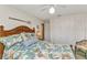 Bedroom showcasing a nautical theme, with ceiling fan, a closet, and a bright, airy feel at 2100 Via Esplanade, Punta Gorda, FL 33950