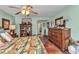 Brightly-decorated bedroom featuring a full-size bed, dressers, and coastal decor at 2100 Via Esplanade, Punta Gorda, FL 33950