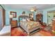Spacious bedroom with a ceiling fan and colorful area rug at 2100 Via Esplanade, Punta Gorda, FL 33950