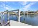 Well-maintained boat lift with neighborhood waterfront views at 2100 Via Esplanade, Punta Gorda, FL 33950