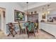 Comfortable dining area features seating for four and updated lighting fixtures at 2100 Via Esplanade, Punta Gorda, FL 33950