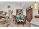 Bright dining area with seating for four and access to the living room at 2100 Via Esplanade, Punta Gorda, FL 33950