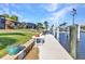 Backyard dock with seating and picturesque views of waterway at 2100 Via Esplanade, Punta Gorda, FL 33950
