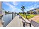 Backyard dock with seating and picturesque views of waterway at 2100 Via Esplanade, Punta Gorda, FL 33950