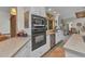 Kitchen featuring modern appliances, ample counter space, and tile flooring at 2100 Via Esplanade, Punta Gorda, FL 33950