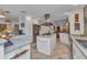 Spacious kitchen with stainless steel appliances, white cabinets, and an island at 2100 Via Esplanade, Punta Gorda, FL 33950
