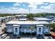 Expansive aerial view of the condo complex surrounded by lush greenery and well-maintained community at 22375 Edgewater Dr # 123, Punta Gorda, FL 33980