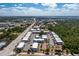 Spacious condo complex with a swimming pool, tennis court, and ample parking surrounded by nature at 22375 Edgewater Dr # 123, Punta Gorda, FL 33980
