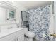 Neat bathroom featuring a vanity, toilet, and shower with a decorative curtain at 22375 Edgewater Dr # 123, Punta Gorda, FL 33980