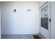 Close-up of a condo entrance with a welcome sign, creating a warm and inviting entry to the home at 22375 Edgewater Dr # 123, Punta Gorda, FL 33980