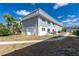 Well-maintained two-story condo building with landscaped grounds and inviting walkway at 22375 Edgewater Dr # 123, Punta Gorda, FL 33980