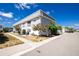 Charming condo complex featuring well-maintained landscaping, sidewalks, and ample parking at 22375 Edgewater Dr # 123, Punta Gorda, FL 33980