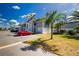 Charming condo complex featuring well-maintained grounds and ample parking with tropical landscaping at 22375 Edgewater Dr # 123, Punta Gorda, FL 33980