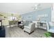 Inviting living room with comfortable seating, stylish decor, and plenty of natural light, perfect for relaxing and entertaining at 22375 Edgewater Dr # 123, Punta Gorda, FL 33980