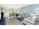 Stylish living room featuring modern furniture, coastal decor, and ample seating, perfect for relaxation at 22375 Edgewater Dr # 123, Punta Gorda, FL 33980