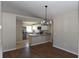 Modern kitchen boasting stainless steel appliances, granite countertops and bright white cabinets at 2250 Homestead Cir, North Port, FL 34286