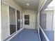 The screened lanai features durable flooring, and offers a transition to the outside, and access to the yard at 2250 Homestead Cir, North Port, FL 34286