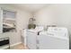 Laundry room featuring washer, dryer, and a window at 2331 Cannolot Blvd, Port Charlotte, FL 33948