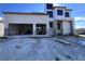 New construction, block home with a two car garage and modern design elements awaiting personalization at 234 Bangsberg Se Rd, Port Charlotte, FL 33952