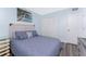 Relaxing bedroom features coastal decor, including beach-themed wall art and a tranquil ambiance at 25225 Rampart Blvd # 1603, Punta Gorda, FL 33983