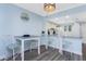 Dining space with seating for four and an open view to the kitchen at 25225 Rampart Blvd # 1603, Punta Gorda, FL 33983