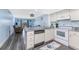 Updated kitchen with white cabinets and stainless steel appliances at 25225 Rampart Blvd # 1603, Punta Gorda, FL 33983