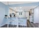 Bright kitchen features granite counters, a breakfast bar and stainless steel appliances at 25225 Rampart Blvd # 1603, Punta Gorda, FL 33983