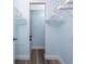 Functional walk-in closet with metal shelving for organized storage and contemporary flooring at 25225 Rampart Blvd # 1603, Punta Gorda, FL 33983