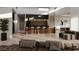 Bright, modern living room with contemporary furniture, a sleek kitchen, and high ceilings at 2523 Ryan Blvd, Punta Gorda, FL 33950