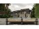 Stunning backyard view featuring a dock, outdoor living area, lush landscaping, and tranquil water views at 2523 Ryan Blvd, Punta Gorda, FL 33950