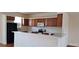 Functional kitchen with ample counter space and a breakfast bar at 2585 Yuma Ave, North Port, FL 34286