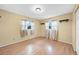 Bedroom with natural light, laminate floors, and neutral walls creating a calming space at 26103 Salonika Ln, Punta Gorda, FL 33983