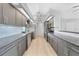 Modern kitchen with sleek countertops, stainless steel appliances, and ample storage space in stylish cabinets at 26103 Salonika Ln, Punta Gorda, FL 33983