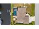 Aerial view of a pool home with outdoor entertaining space and a private boat dock at 2911 Riverside Dr, Punta Gorda, FL 33950