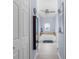 Bright bathroom with a large tub, tile floors, a full mirror, and a window at 2911 Riverside Dr, Punta Gorda, FL 33950