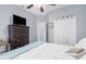 Relaxing bedroom with a ceiling fan and a view of the closet, providing a tidy and comfortable space at 2911 Riverside Dr, Punta Gorda, FL 33950