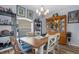 Cozy dining room featuring hardwood floors, stylish décor, and plenty of natural light at 2911 Riverside Dr, Punta Gorda, FL 33950