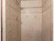 Close-up of a shower with decorative tiled walls and a modern showerhead, exuding cleanliness at 30154 Beech Rd, Punta Gorda, FL 33982