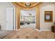 Elegant foyer showcasing decorative archways and tile flooring leading into the living spaces at 3050 Rivershore Ln, Port Charlotte, FL 33953