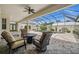 Inviting screened-in pool area with comfortable seating and a serene outdoor ambiance at 3050 Rivershore Ln, Port Charlotte, FL 33953