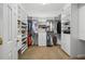 Large walk-in closet with custom shelving and storage space at 3050 Rivershore Ln, Port Charlotte, FL 33953