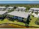Lakeside multi-Gathering home with screened lanais and landscaping near a beautiful community and golf course at 3412 Grand Vista Ct # 202, Port Charlotte, FL 33953