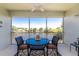 Enclosed Lanai overlooking water with table and chairs to enjoy the view at 3412 Grand Vista Ct # 202, Port Charlotte, FL 33953