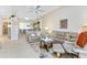 Spacious living room with tile floors, vaulted ceilings and view to the kitchen at 3412 Grand Vista Ct # 202, Port Charlotte, FL 33953