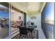 Inviting screened patio offers a serene spot with ceiling fan and lovely view into the home and out to the water at 3412 Grand Vista Ct # 202, Port Charlotte, FL 33953