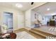 Living room view showcasing open floor plan, steps to kitchen and dining area at 3502 N Lincoln Ave, Tampa, FL 33607